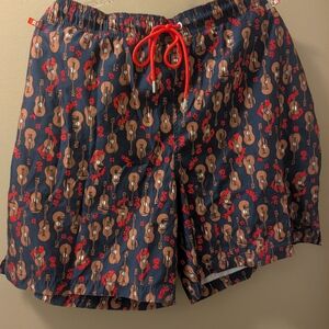 Lands' End Navy Swim Trunks with Brown ukulele Print and Red Lining